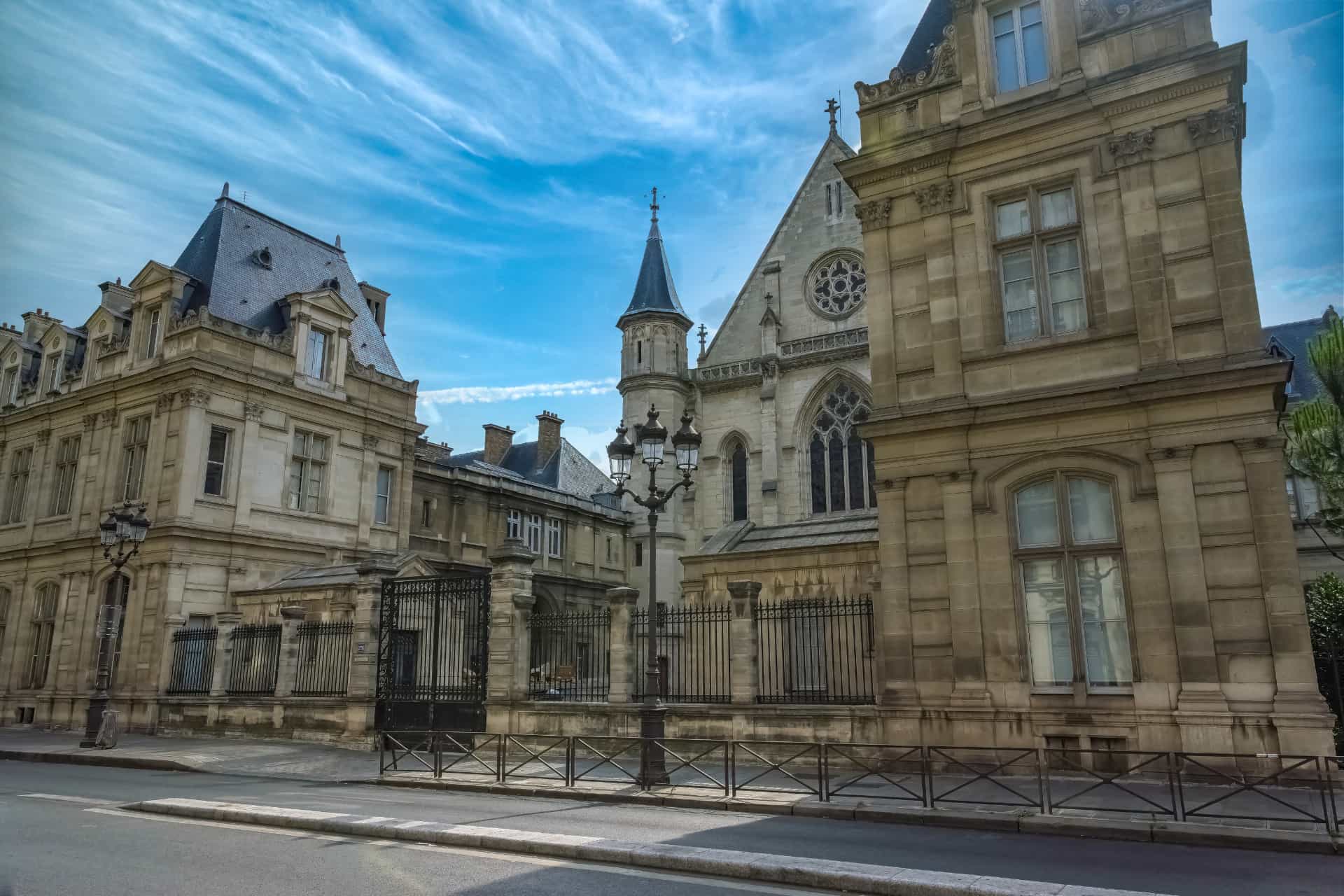 Historic museum building in Paris with a stone courtyard and traditional French architecture