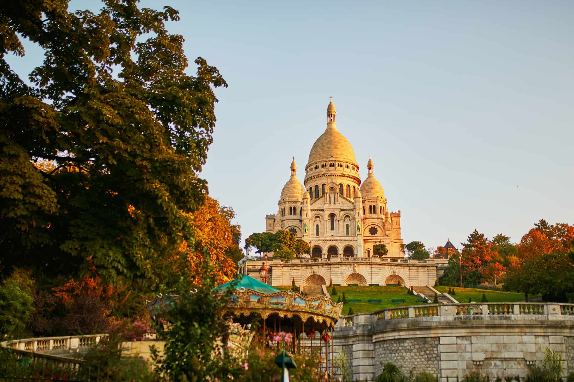 Sacré-Cœur Basilica in Montmartre, Paris, surrounded by trees